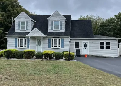 Full exterior home improvement in South Jersey coordinating siding with windows, roofing, and doors